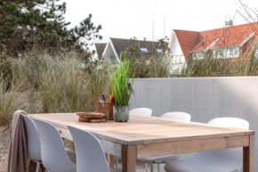 Brand new apartment with two sunny terraces and private parking
